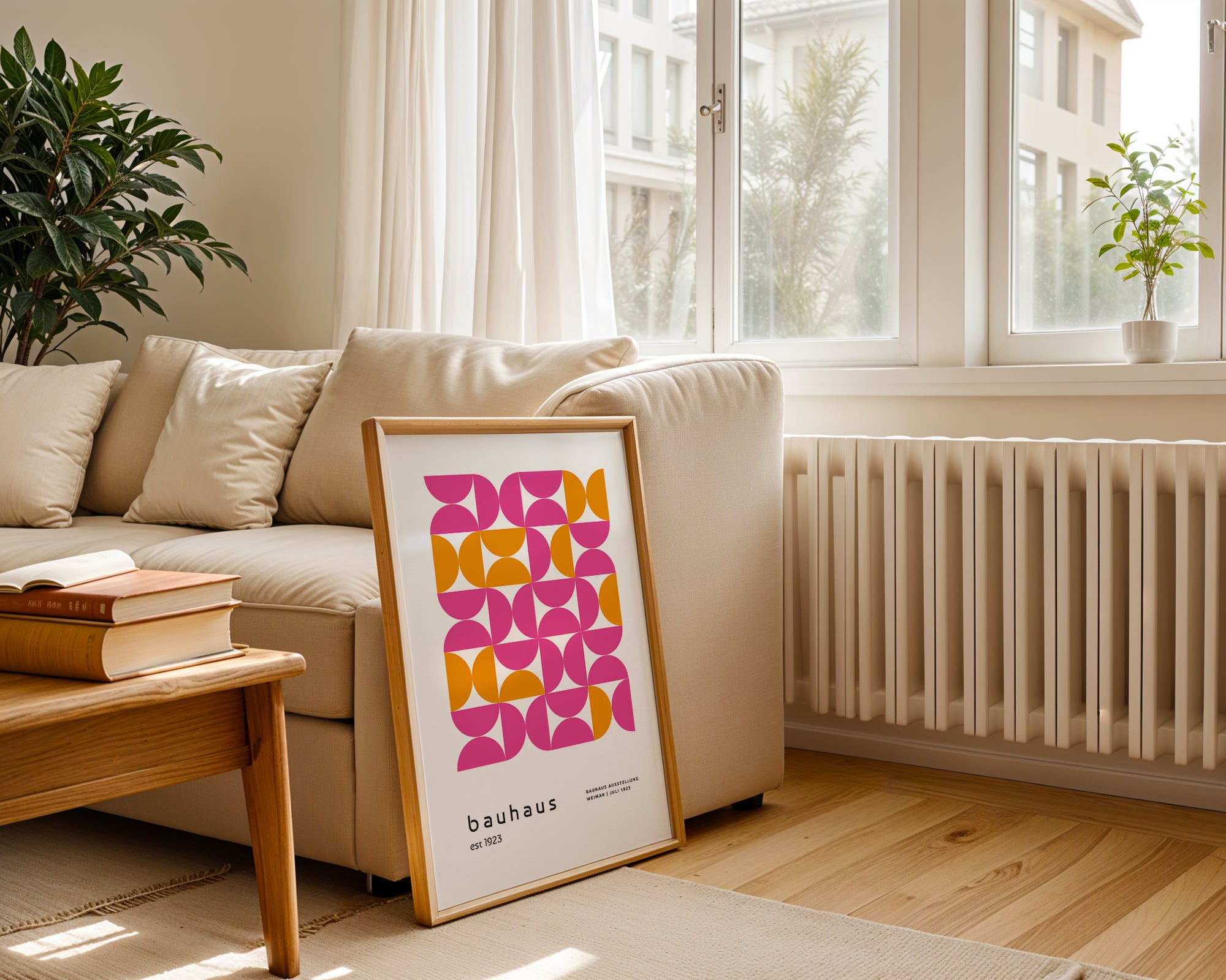Living room with a beige sofa, wooden coffee table, and a colorful abstract art print on a stand.