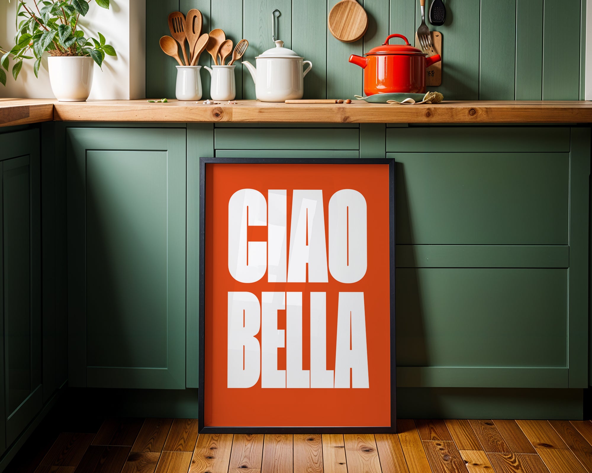 Kitchen interior with a 'CIAO BELLA' poster on a green wall.