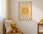 Children's room with teddy bear, 'Hello Sunshine' wall art, and small table with toys.
