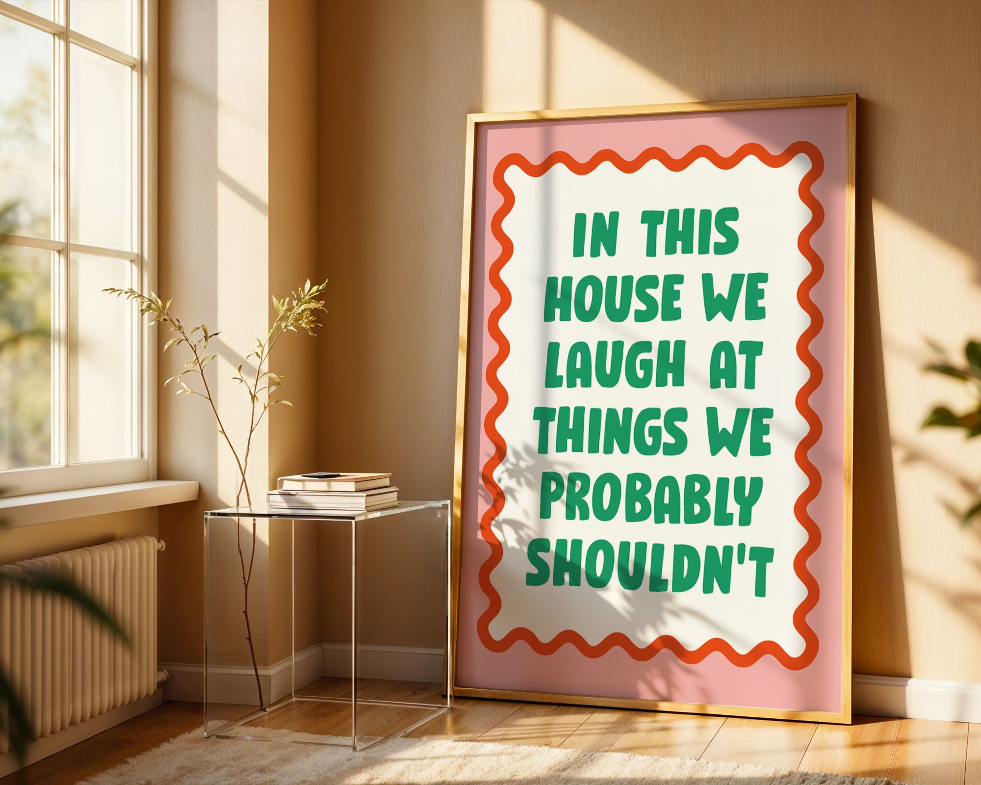 Framed poster with humorous quote in a sunlit room