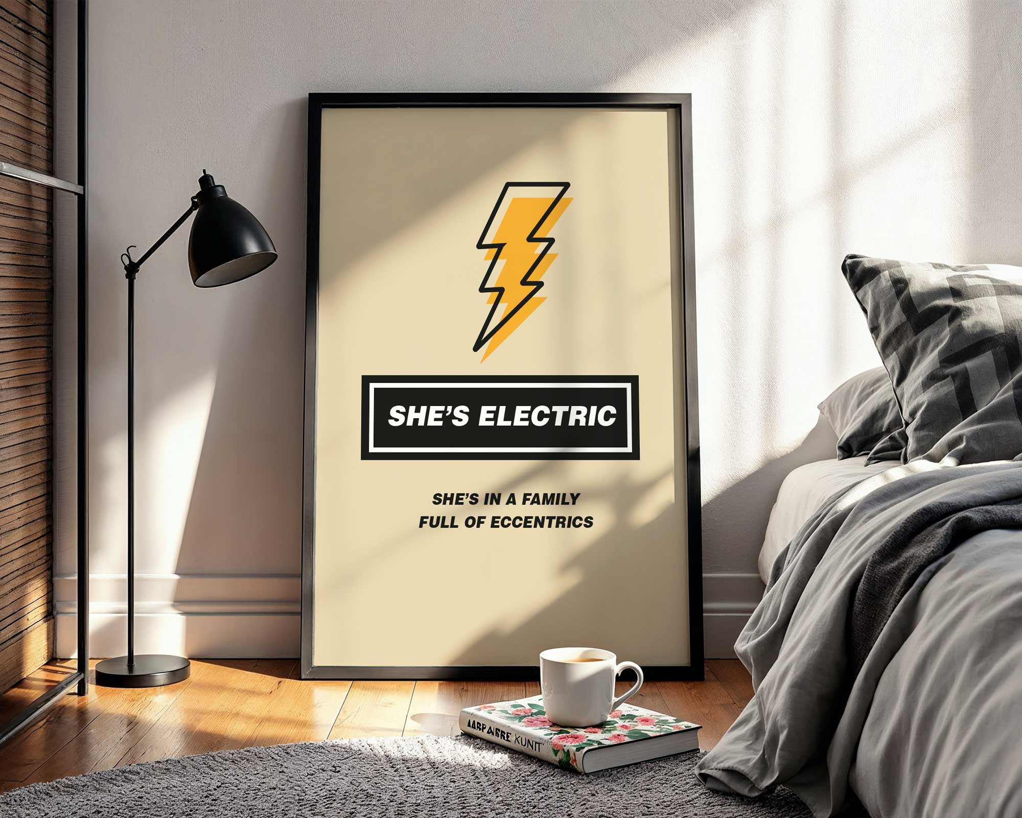 Framed poster with a lightning bolt design and text in a bedroom setting.