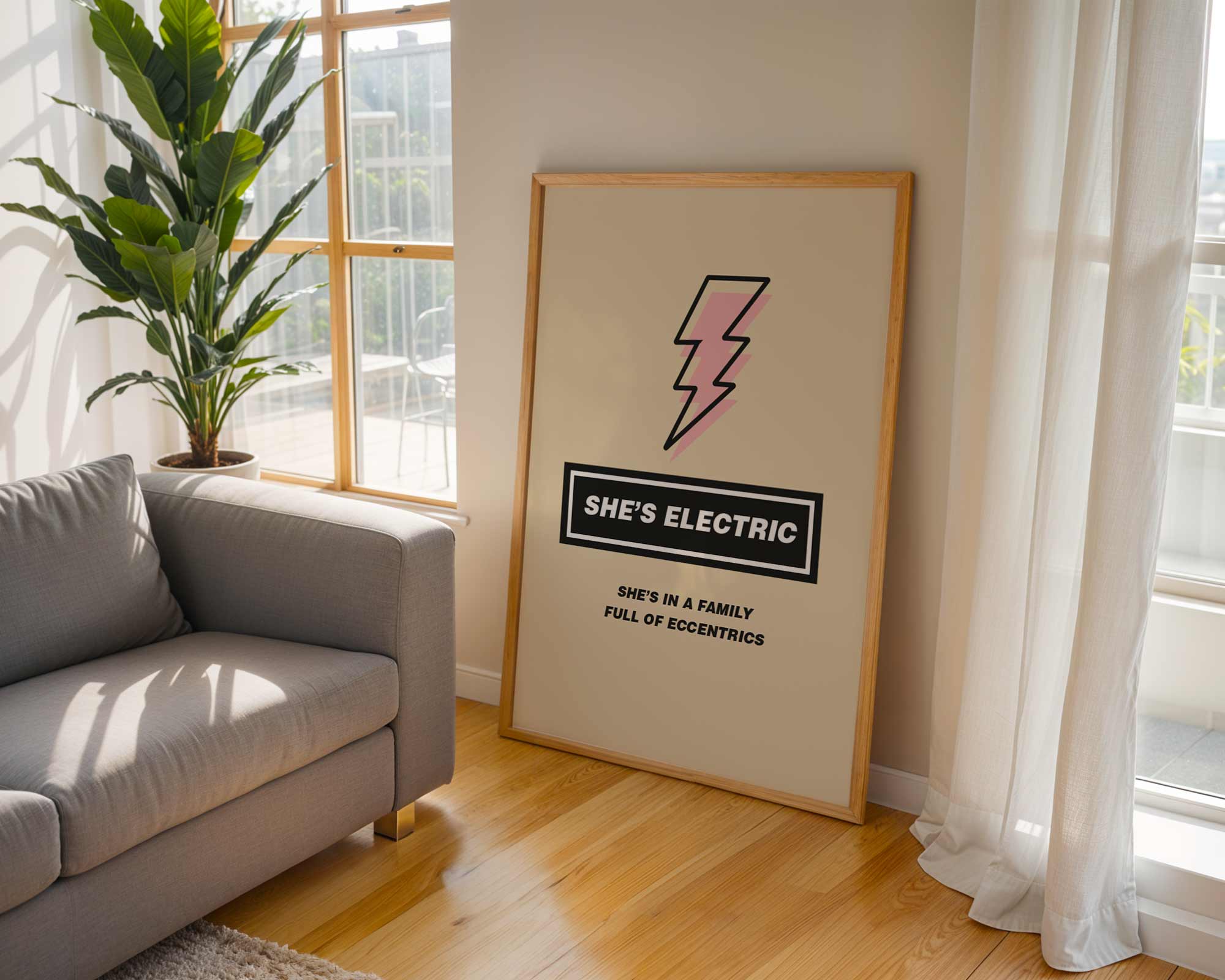 Framed artwork with a lightning bolt design on a wall in a living room.