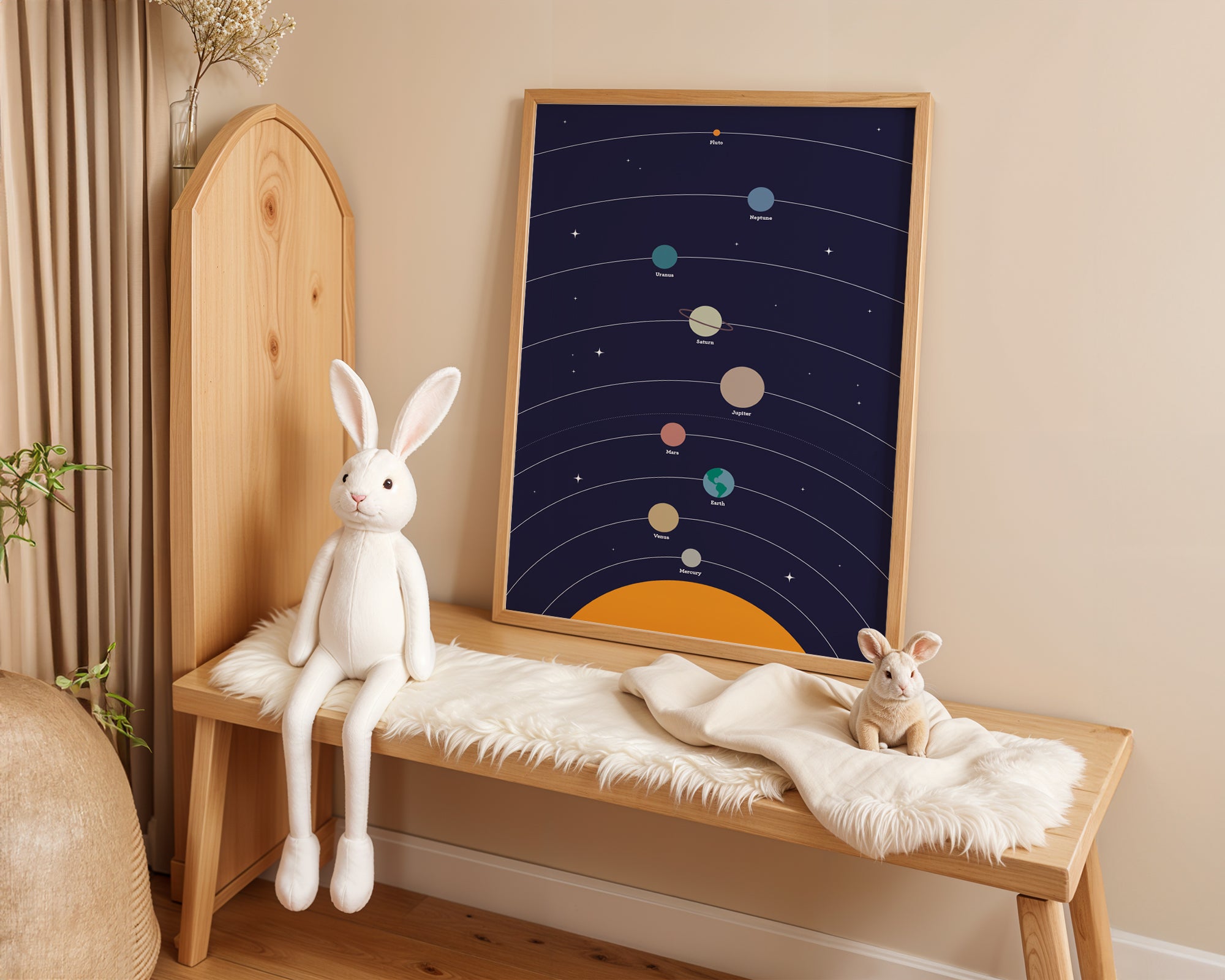 Wooden bench with plush toys and a framed solar system diagram on a beige wall.