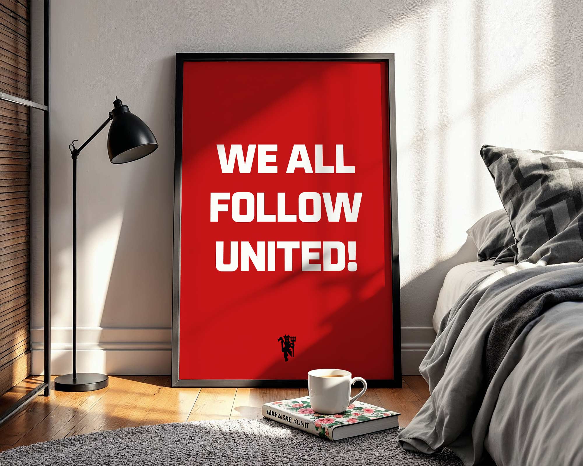 Framed poster with 'WE ALL FOLLOW UNITED!' text in a bedroom setting.